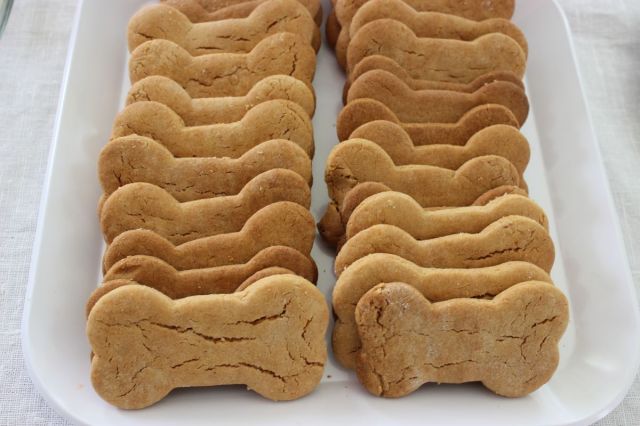 Peanut Butter cookie mix, with a little added flour upon cutting, makes these dog bone cookies look like real dog biscuits.  For Peanut sensitive kids, oatmeal would work great too.