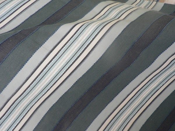 The bold stripe fabric is Robert Allen Hull in Aegean and photos don t do it justice. It appears to be a tiny bit sun washed, it s soft to the hand, and has little chenille vertical stitches that give it a classic grosgrain ribbon look to it in French Coast sea blues and faded greens. Classic. Ocean-inspired, without an obvious nautical theme . The bold stripe fabric is Robert Allen Hull in Aegean and photos don t do it justice. It appears to be a tiny bit sun washed, it s soft to the hand, and has little chenille vertical stitches that give it a classic grosgrain ribbon look to it in French Coast sea blues and faded greens. Classic. Ocean-inspired, without an obvious nautical theme .