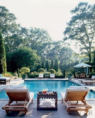 The best pools, I think, are surrounded by more greenery than concrete or tile, like this one, don t you think?