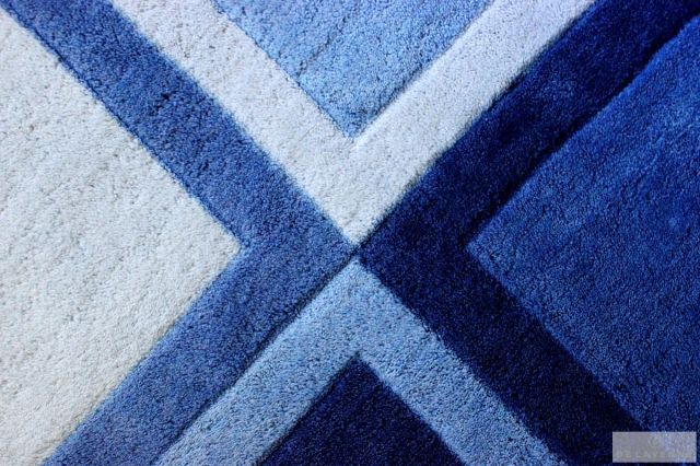 This rug has been with us since my son was 3.  I bought it at Target.It has so many blues to offer to future room changes. We could add green, or orange, or red, grey, you name it for future accent colors, which adds  the longevity I talk about in the article.